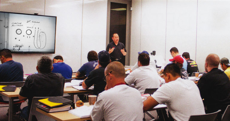A man standing in front of a group of people.